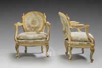 Paire de fauteuils de style Transition Louis XV - Louis XVI par JANSEN JEAN-HENRI