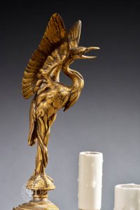 Grande paire de candélabres antiques modèle aux cigognes d’après Ferdinand Barbedienne et Antoine-Louis Barye